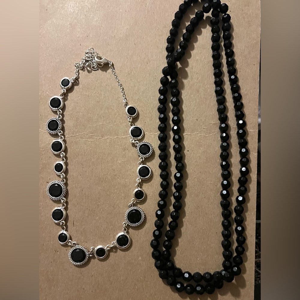 2 black necklaces